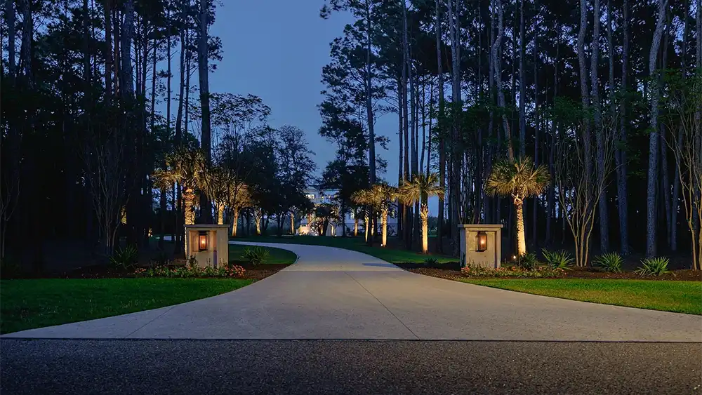 HOME FOR SALE: Beautiful night photo showing the driveway entrance to the property at 288 Tipperary Place, Pawleys Island, SC