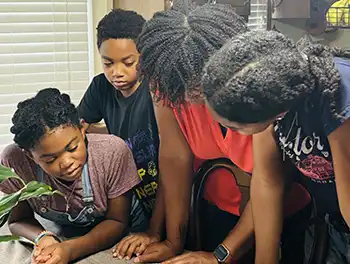 Adrian Sullivan teaching her students from home.