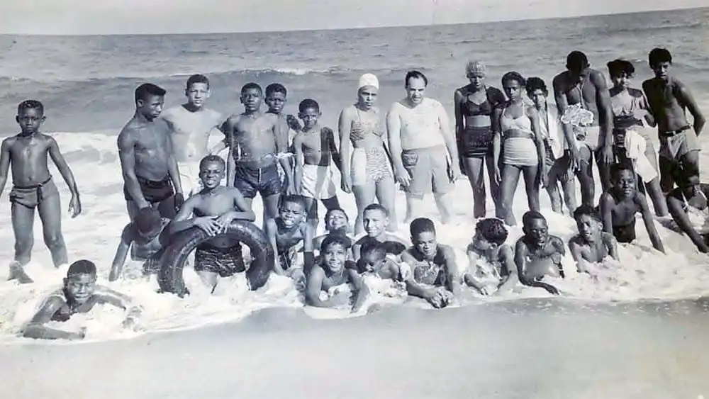 Beachgoers on Magnolia Beach, South Carolina. Photo provided by Jake Lee Real Estate.