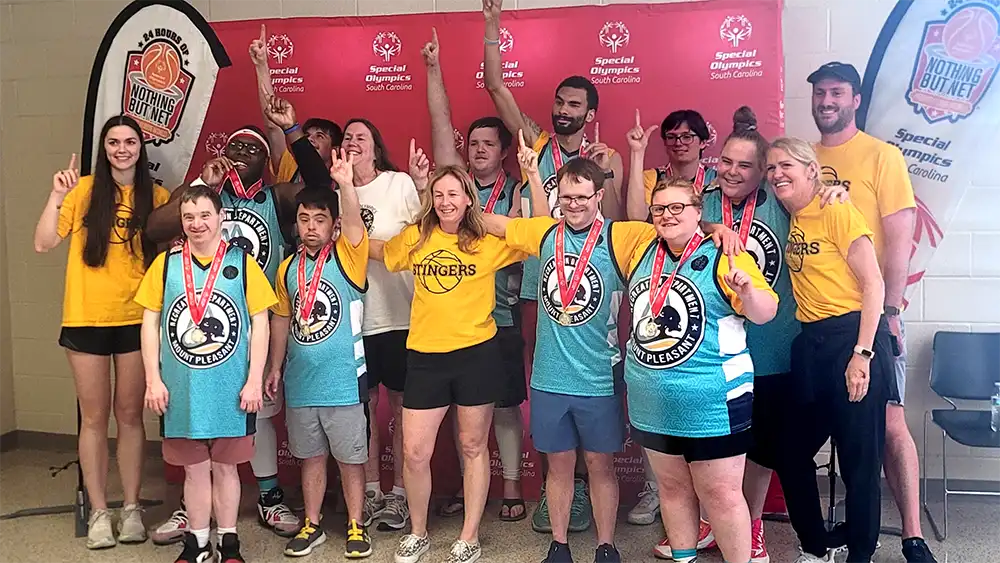 Mount Pleasant Stingers, SOSC photo, athletes with gold medals.
