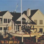 A view from the Isle of Palms Marina General Store showing boats piled up in the back of a Wild Dunes home on the Waterway Isle.