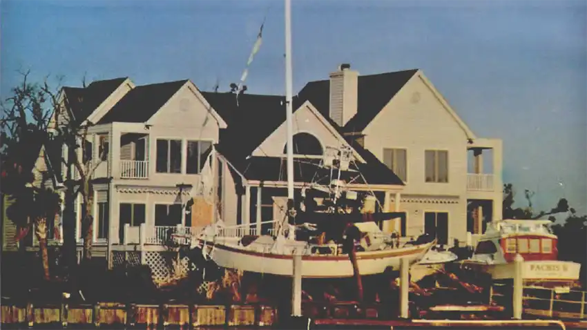 A view from the Isle of Palms Marina General Store showing boats piled up in the back of a Wild Dunes home on the Waterway Isle.