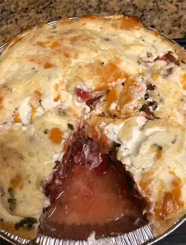 PHOTO: A tomato pie in its aluminum foil pie pan
