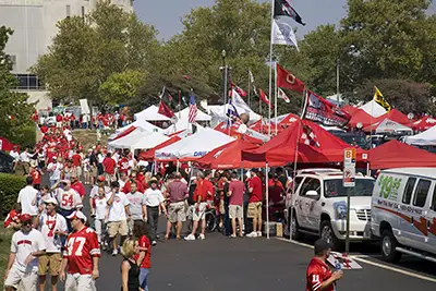 Stock photos: Fans tailgating before a football game.