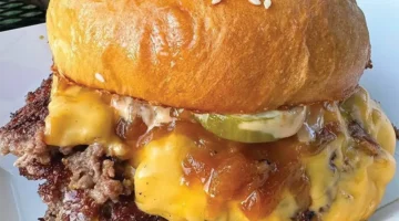 Smashed quarter-pound burger by BlackOut Burger