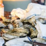 Lowcountry Oysters on a table, shucked for eating