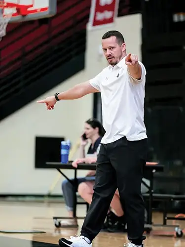 Wando Boys Basketball: John Reynolds directing traffic during a Wando practice.