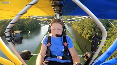 Raven’s Run resident Alina Scott takes flight from her neighborhood’s private air strip