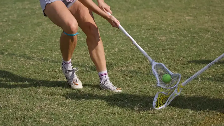 Girls' high school lacrosse in action.